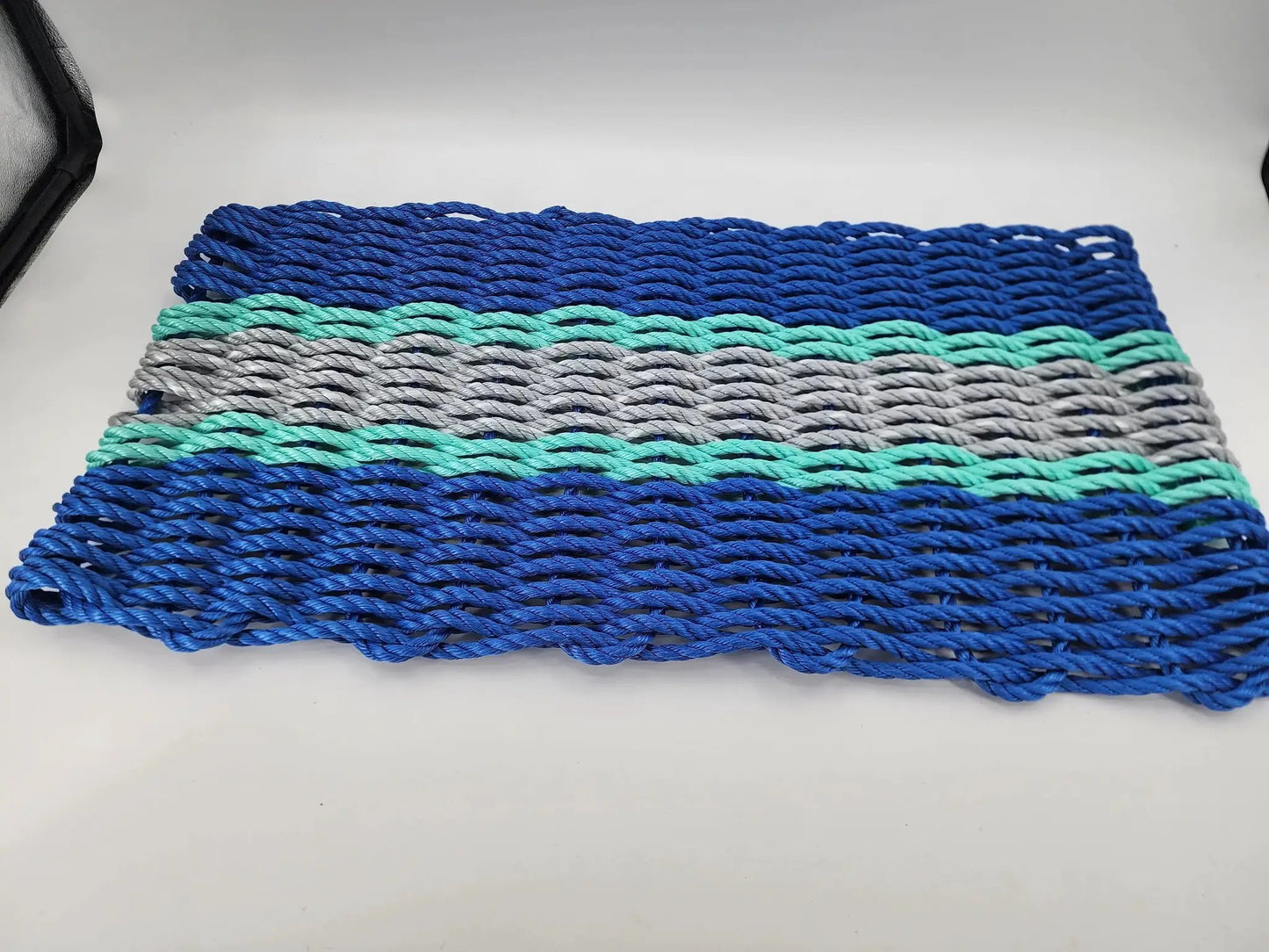 Lobster rope door mat in blue gray teal accents with braided rope strands by Little Salty Rope on Tampa Home & Garden Store