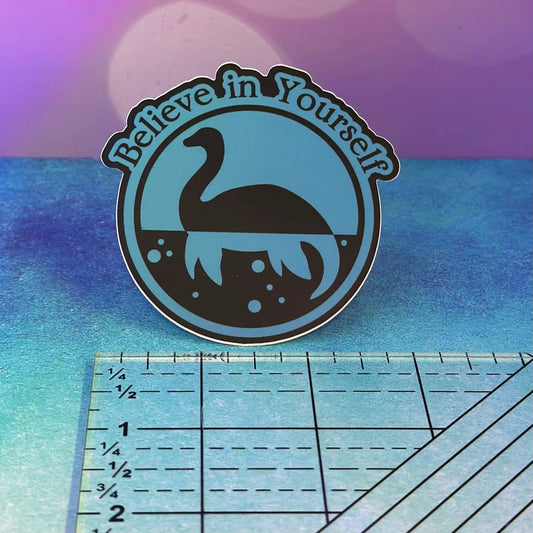Loch Ness Monster silhouette sticker, teal circular Nessie badge by Thistle & Stitch on Tampa Home & Garden Store