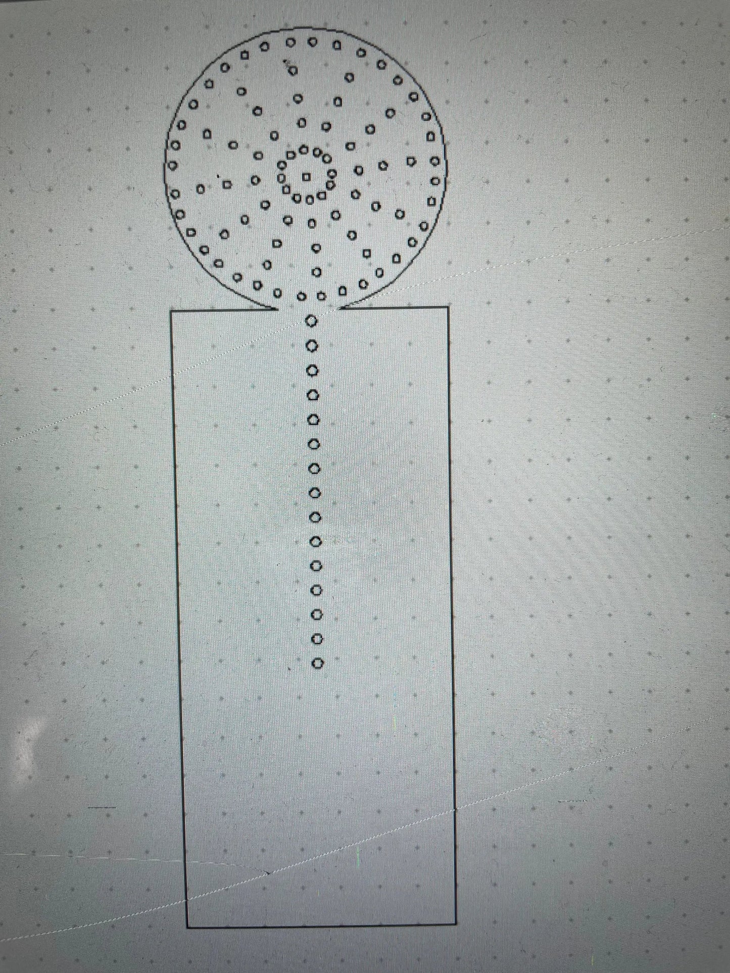 Lollipop candy prop with dotted circular head and long stick on a display base for decorative use on Tampa Home & Garden Store