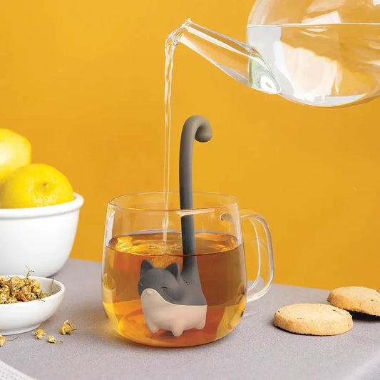 Louie cat-shaped tea infuser by OTOTO DESIGN, gray cat with white belly in amber tea on Tampa Home & Garden Store