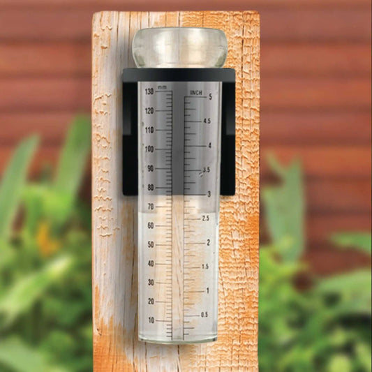 Luster Leaf Rapitest rain gauge with bracket on wood post, silver gauge with inch marks on Tampa Home & Garden Store