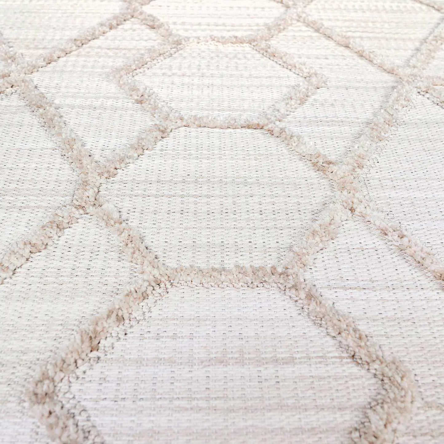 Malilinao area rug in cream and beige with a diamond pattern Boutique Rugs on Tampa Home & Garden Store