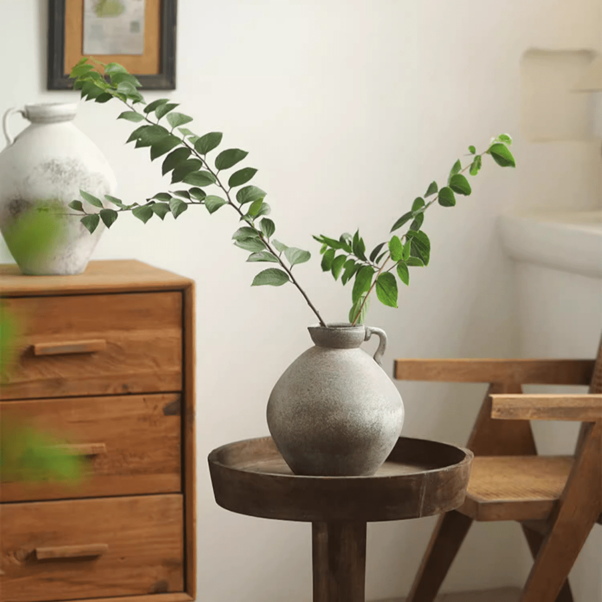 Watertight One Handle Pottery Vase, grey ceramic with a single handle on a wood table on Tampa Home & Garden Store