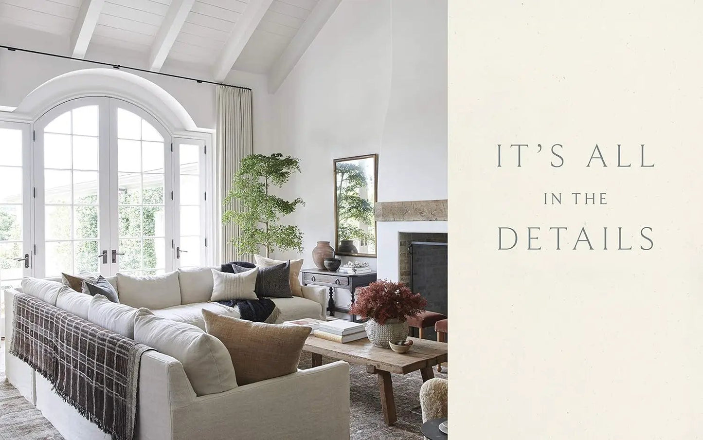 Made for Living coffee table book in a bright living room with white sofa on Tampa Home & Garden Store