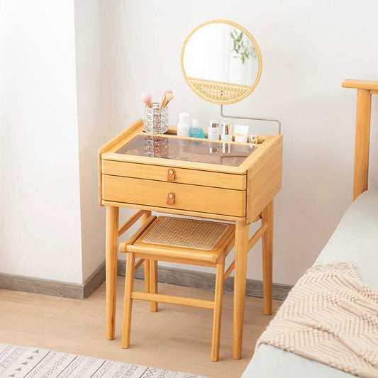 Rotating bamboo vanity table with circular mirror, glass top, and stool on Tampa Home & Garden Store