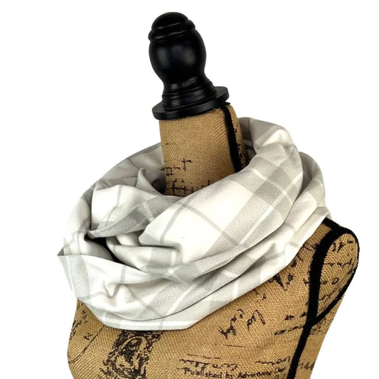 Scarf Thistle & Stitch marshmallow white and grey cotton plaid draped on mannequin on Tampa Home & Garden Store