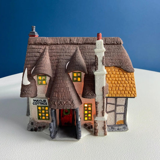 MayLie Cottage Porcelain Christmas Village House with thatched roof, lit windows on Tampa Home & Garden Store