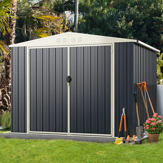 Metal storage shed with lockable double doors, dark gray panels and cream trim on concrete pad on Tampa Home & Garden Store