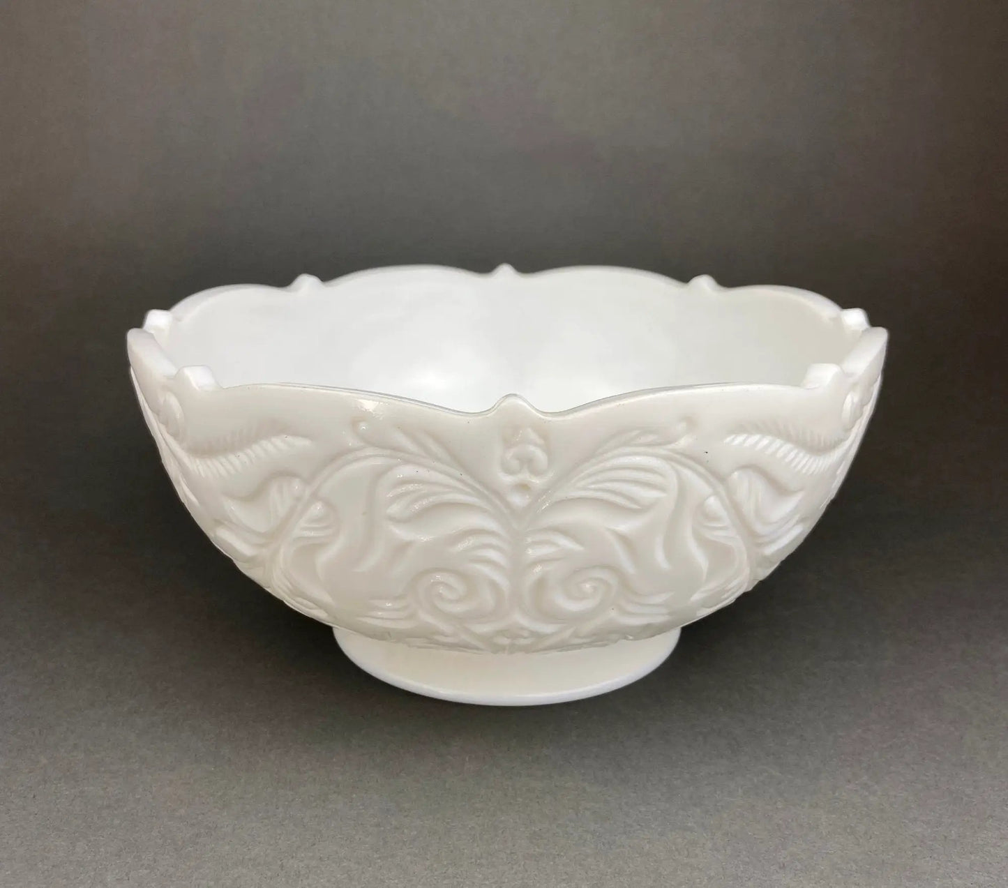 Milk glass footed serving bowl by Anything Discovered with scalloped edge and scroll pattern on Tampa Home & Garden Store