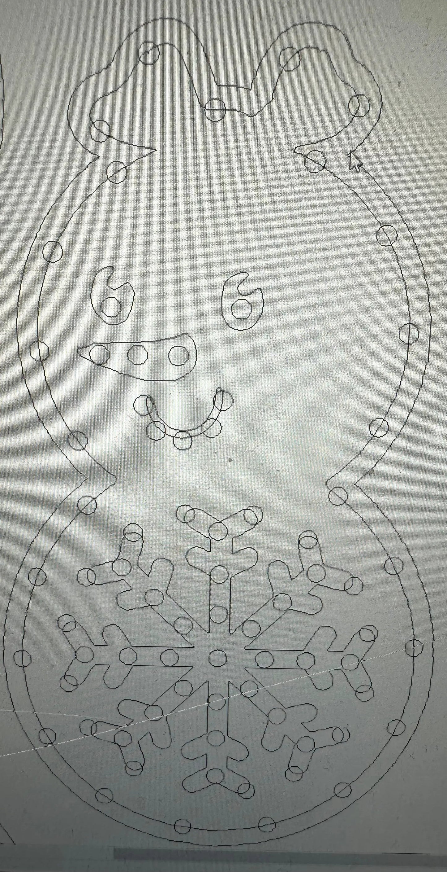 Mini Snowgirl Decor outline inside an oval frame with rivet border and a snowflake motif on Tampa Home & Garden Store