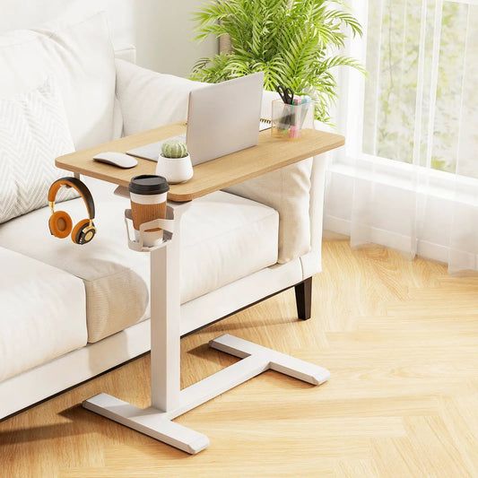 Mobile standing desk overbed table with cup holder, light wood top and white frame on Tampa Home & Garden Store