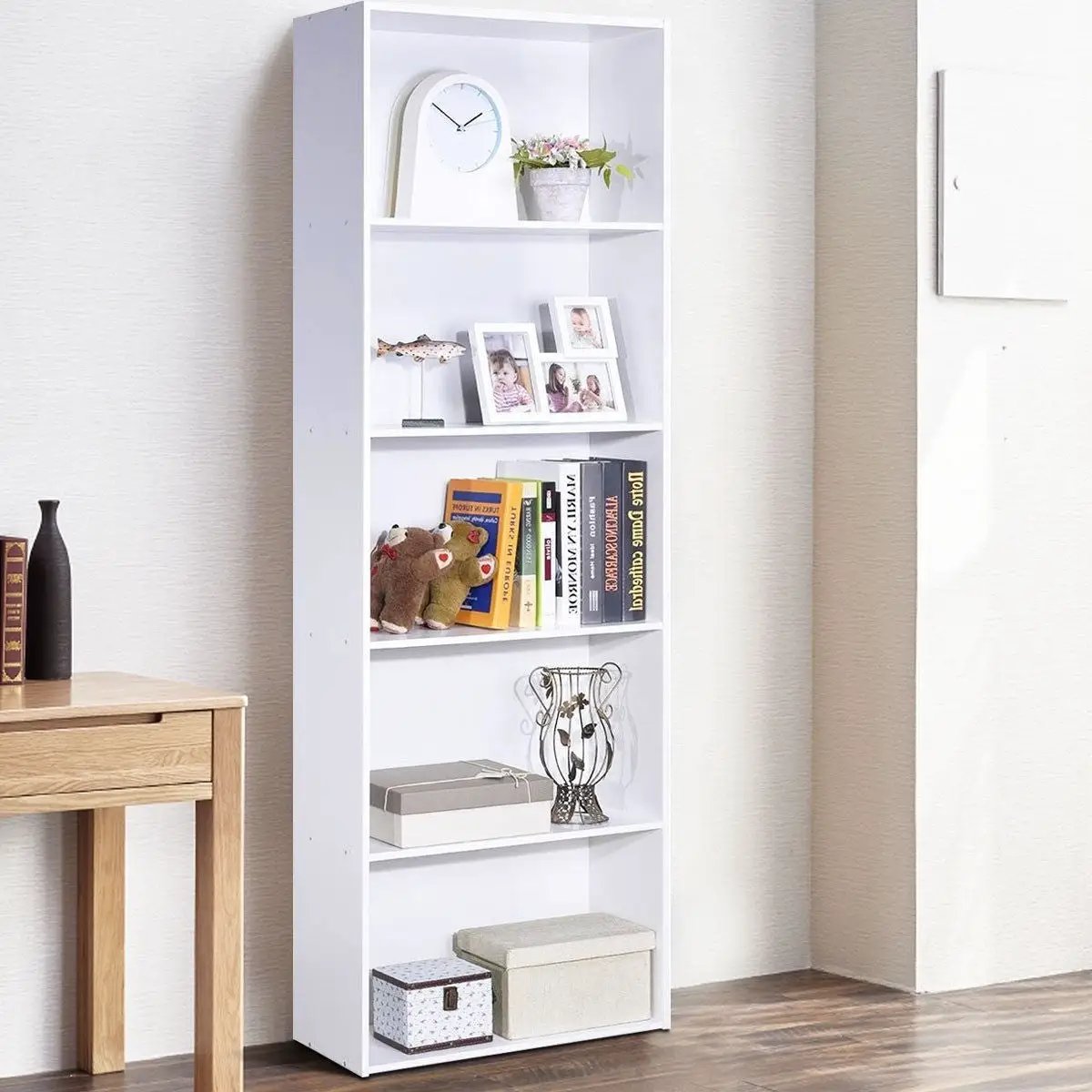 HomePacific white 5-tier bookcase storage shelf with framed photos and books on Tampa Home & Garden Store