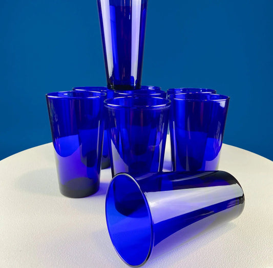 Set of five cobalt blue glass tumblers with tapered rims on Tampa Home & Garden Store