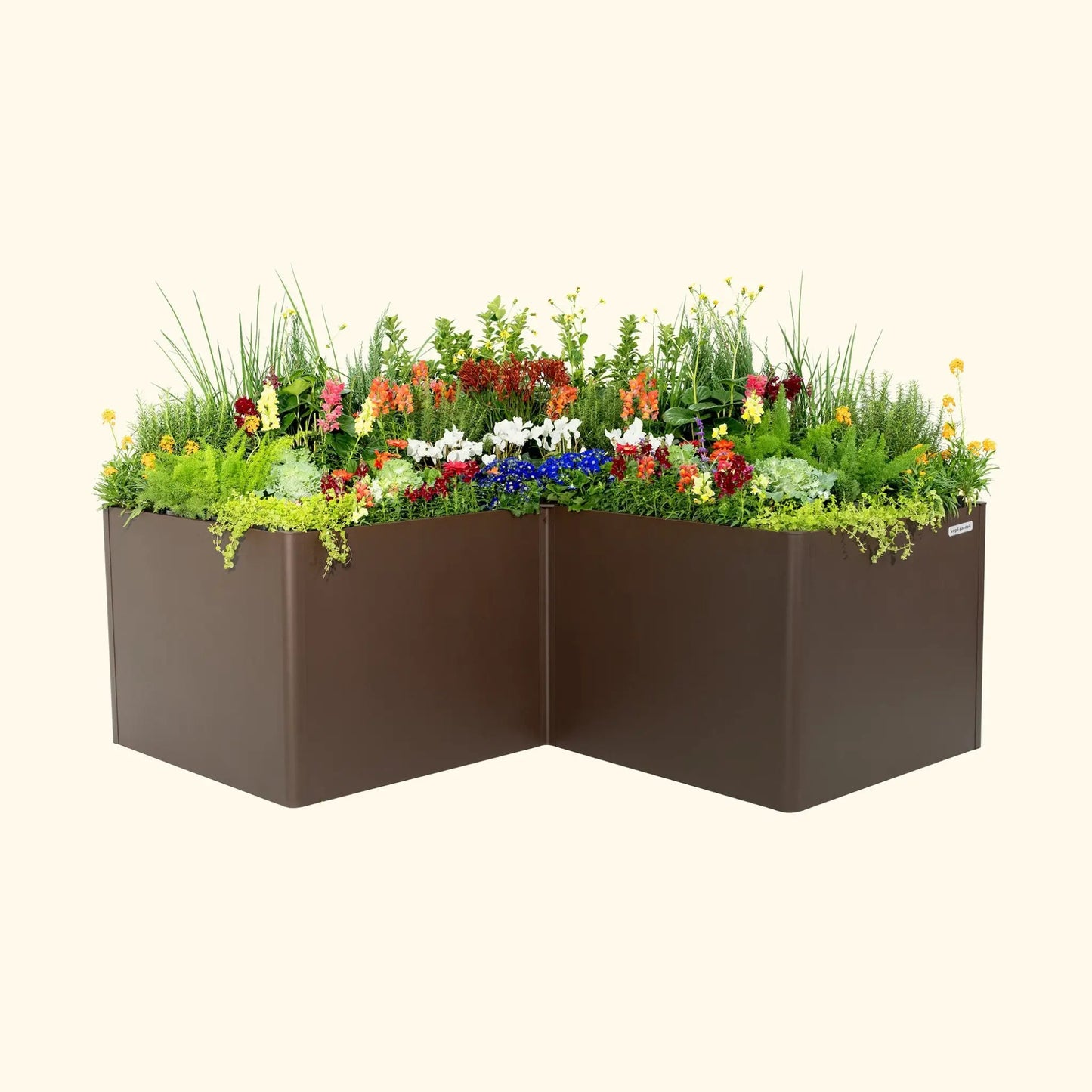 L-shaped brown raised garden bed filled with colorful flowers and lush greenery on Tampa Home & Garden Store