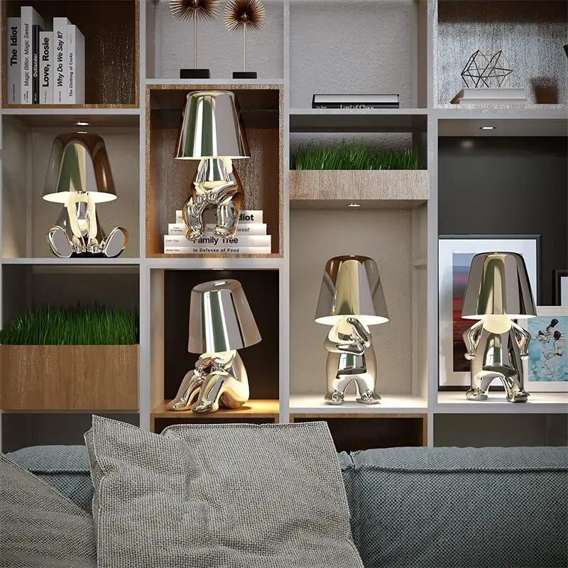 Modern cordless table lamp set: six chrome animal lamps with dome shades on a cubby shelf unit on Tampa Home & Garden Store