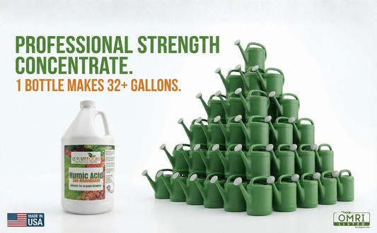 Organic Liquid Humic Acid bottle by GS Plant Foods beside a stack of green watering cans on Tampa Home & Garden Store