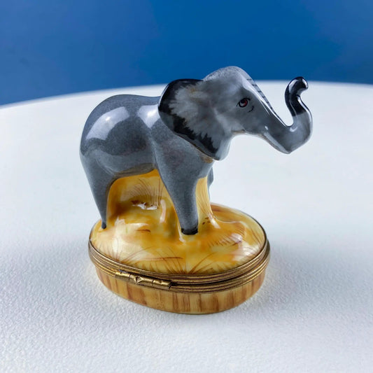 Mom and Baby Elephants Royale Limoges Box figurine, porcelain with yellow interior on base on Tampa Home & Garden Store