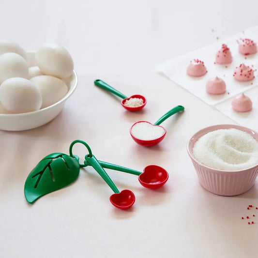 Mon Cherry measuring spoons and egg separator set in green with red heart scoops by OTOTO DESIGN on Tampa Home & Garden Store