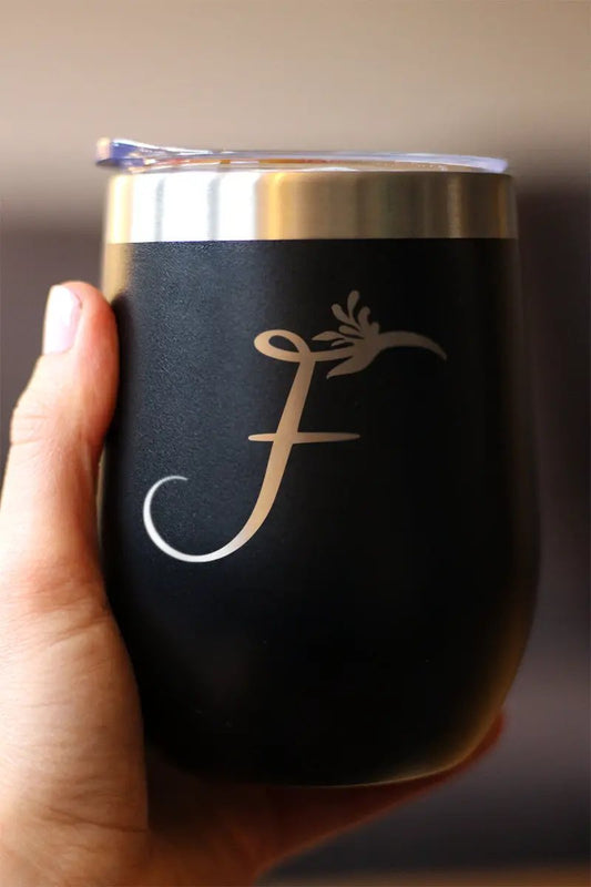 Wine tumbler bevvee Monogram Floral Initial F in matte black with gold floral F and lid on Tampa Home & Garden Store