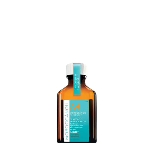 Moroccanoil Treatment Light bottle for fine hair, amber glass with turquoise label and white cap on Tampa Home & Garden Store