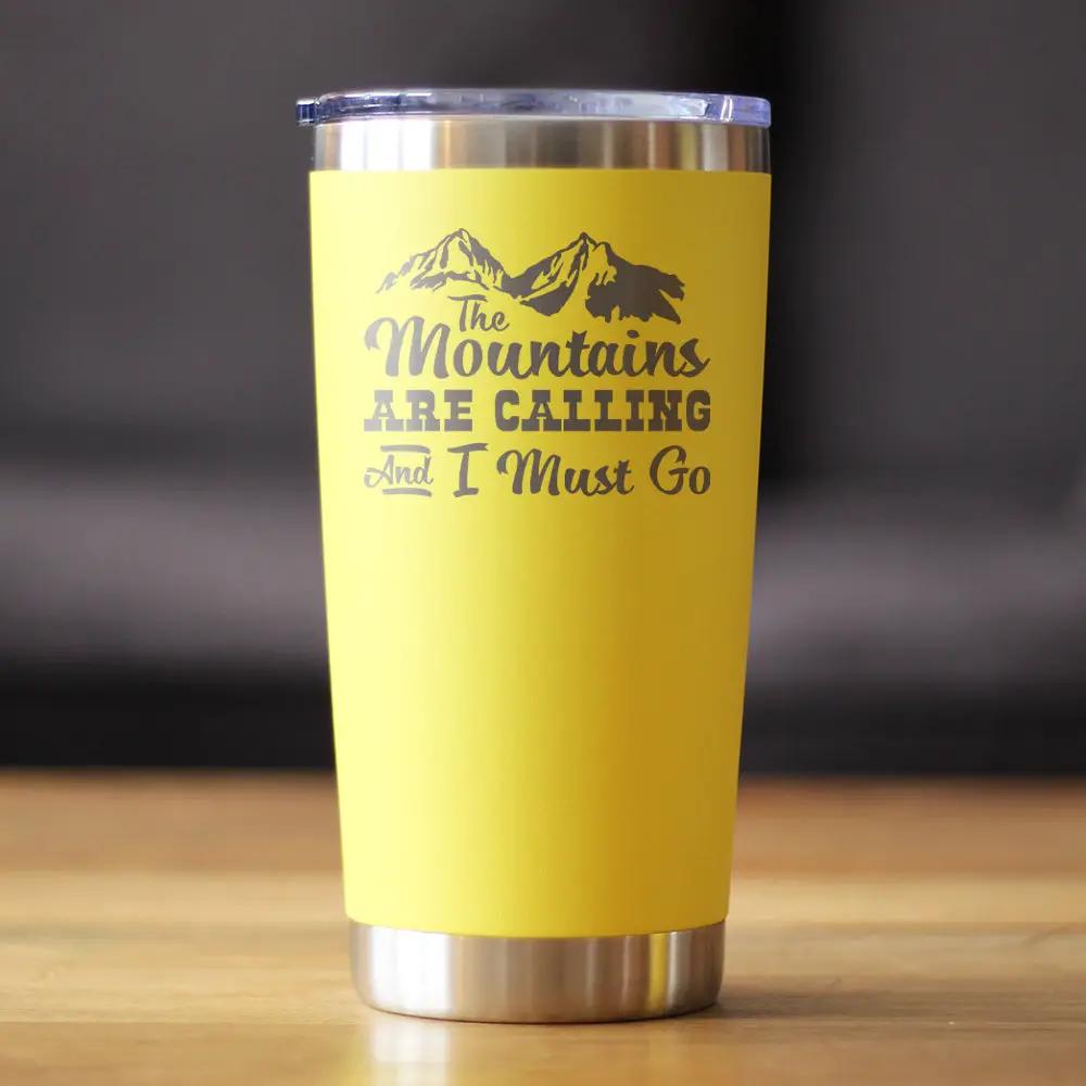 bevvee Mountains Are Calling insulated tumbler with yellow body and clear sliding lid on Tampa Home & Garden Store