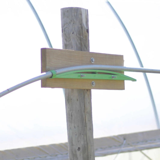 Gothic Hoop Bender mounted on a wooden post with green metal arch brace Bootstrap Farmer on Tampa Home & Garden Store