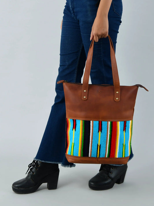 Multicoloured patchwork leather tote bag with brown handles on Tampa Home & Garden Store