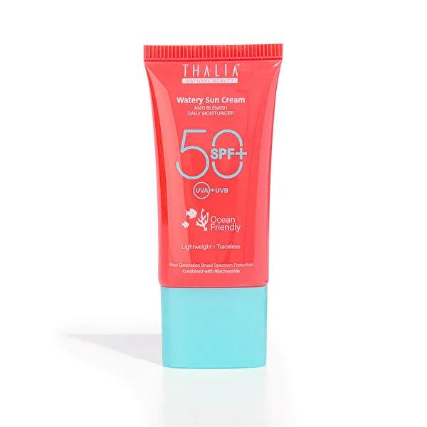 Thalia SPF 50 water-based sunscreen tube in coral pink with blue cap by Beauty Care Bag on Tampa Home & Garden Store