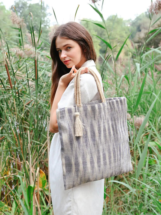 Nadi Jute Tote Bag Blue by KORISSA striped gray fabric with natural rope handles and tassel on Tampa Home & Garden Store