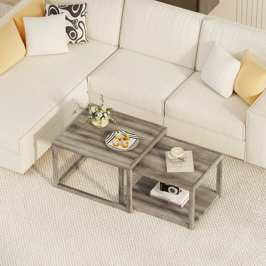 Nesting coffee tables set of 2 in gray wood finish with lower shelf near a beige sectional on Tampa Home & Garden Store