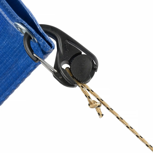 CamJam Cord Tightener 4-pack black plastic clamp with tan paracord on blue tarp Moon Anchors on Tampa Home & Garden Store