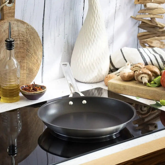 Cristel 1826 nonstick frying pan stainless steel skillet on stove with handle; mushrooms on Tampa Home & Garden Store