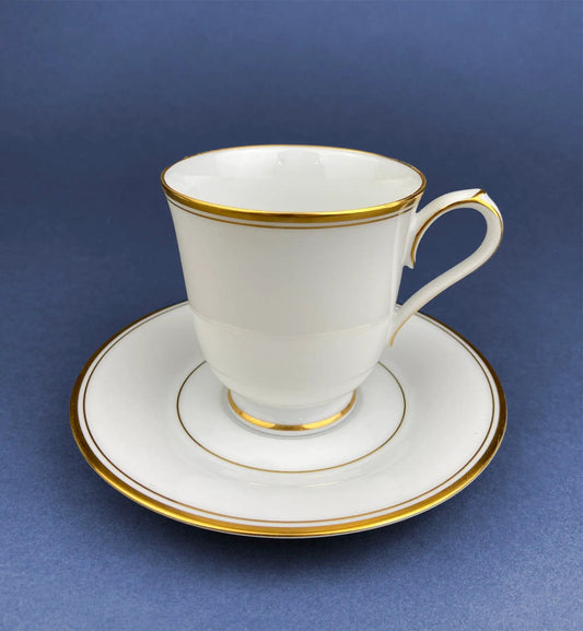 Teacup and saucer, Noritake Allison with gold band trim on white porcelain on Tampa Home & Garden Store