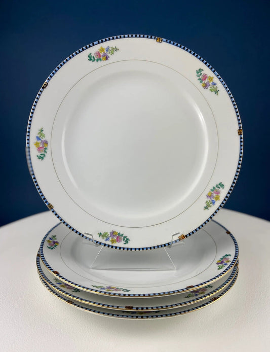 Noritake Sheridan dinnerware with floral bouquets and beaded rim, bowls and saucers stacked on Tampa Home & Garden Store
