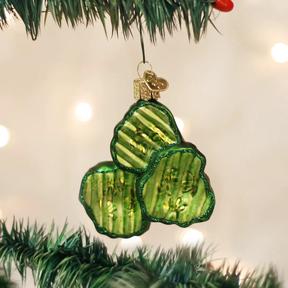 Dill pickle chips ornament, three green glitter-edged pickle slices with a gold cap on Tampa Home & Garden Store