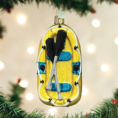 Old World Christmas Raft Ornament, yellow raft with blue paddles and white oars on Tampa Home & Garden Store