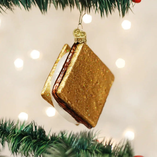 Old World Christmas S'more ornament gold glitter finish with marshmallow and chocolate layers on Tampa Home & Garden Store