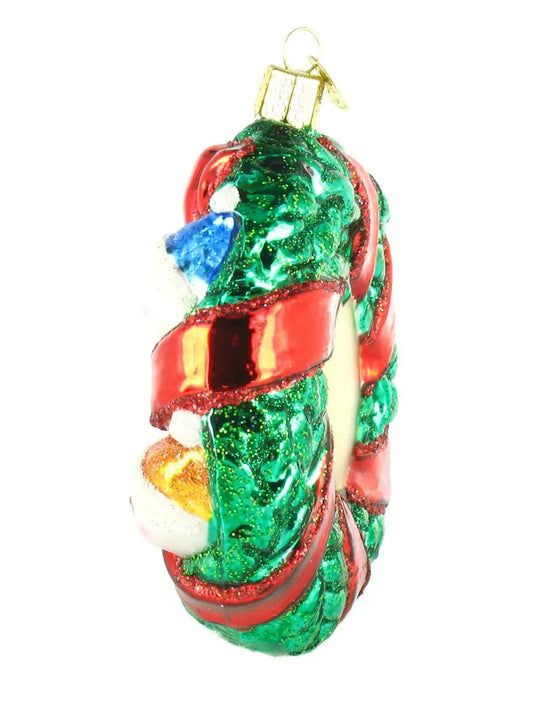 Old World Christmas Snowman Family Wreath glass ornament with green and red glitter on Tampa Home & Garden Store