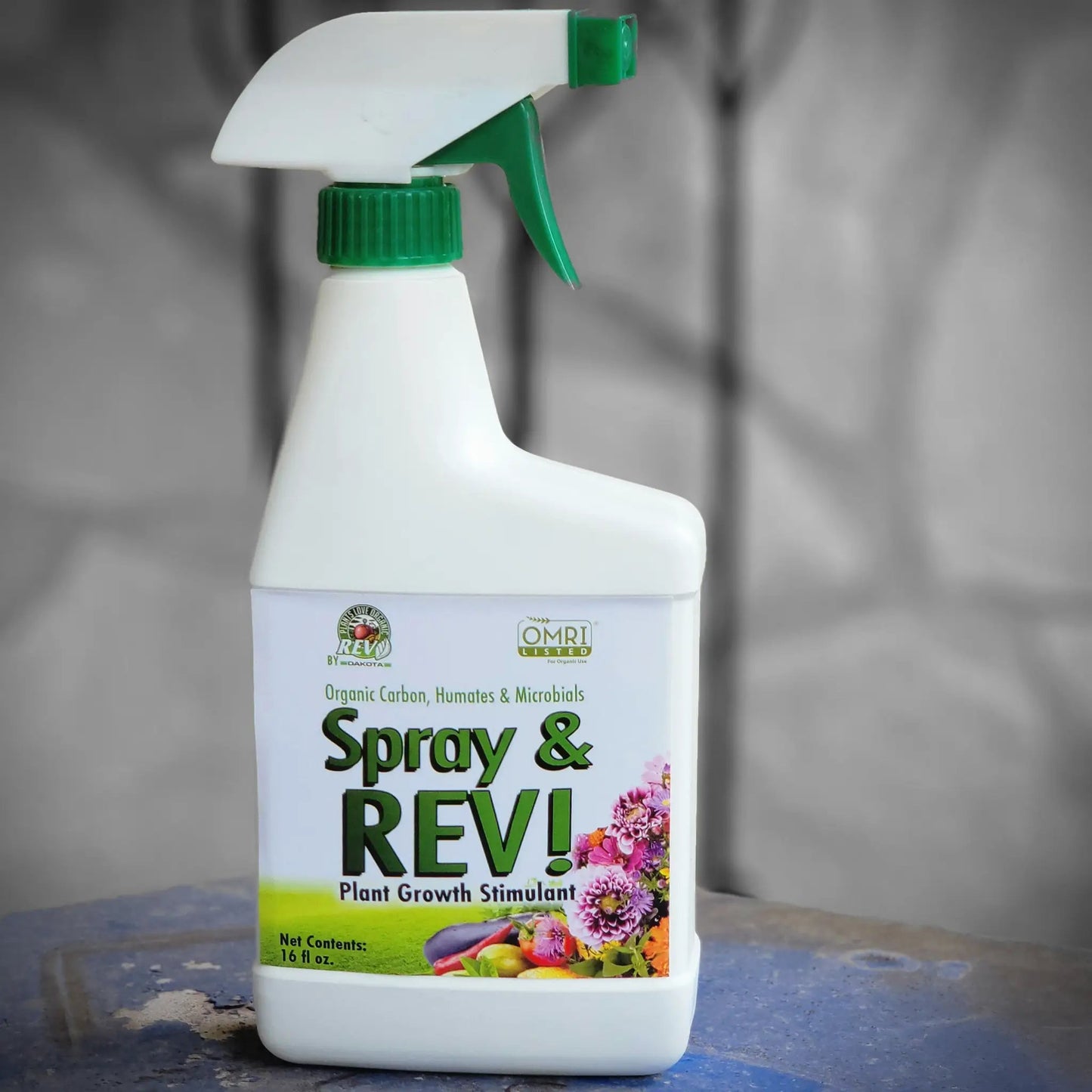 Organic Rev Liquid Plant Food Spray indoor fertilizer bottle with green nozzle on Tampa Home & Garden Store