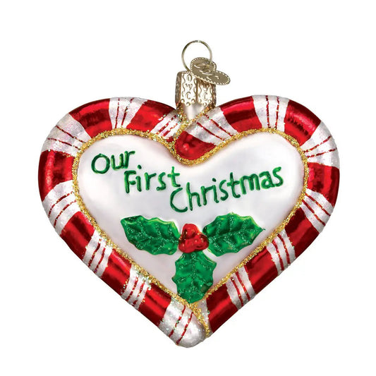 First Christmas Peppermint Heart Glass Ornament with red white candy border and holly accent on Tampa Home & Garden Store