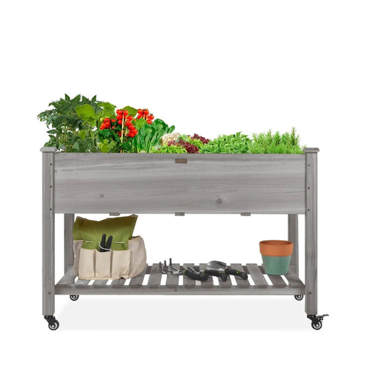 Outdoor grey wood raised garden bed planter on wheels with shelf, filled with tomatoes and herbs on Tampa Home & Garden Store