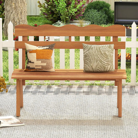 Outdoor Acacia Wood Bench with two cushions and 800 lb capacity in natural finish on a garden patio on Tampa Home & Garden Store