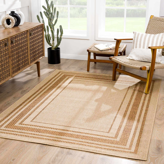 Isoko bordered faux jute outdoor rug in natural beige with a striped border Boutique Rugs on Tampa Home & Garden Store