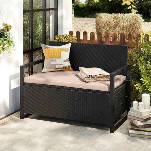 Patio storage bench with hidden storage, black wicker, beige cushion, decorative throw pillow on Tampa Home & Garden Store