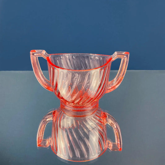 Peach depression glass sugar and creamer jars with ribbed fluted design and side handles on Tampa Home & Garden Store
