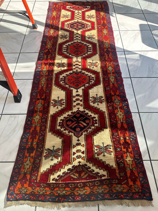 Rugistan Persian Meshgi Wool Runner 3ft 6in x 9ft 10in ivory field with red geometric medallions and borders on Tampa Home & Garden Store