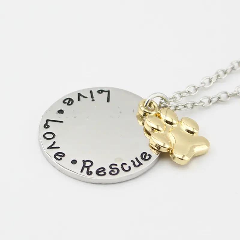 Live Love Rescue paw necklace with silver round tag and gold paw charm on stainless chain on Tampa Home & Garden Store