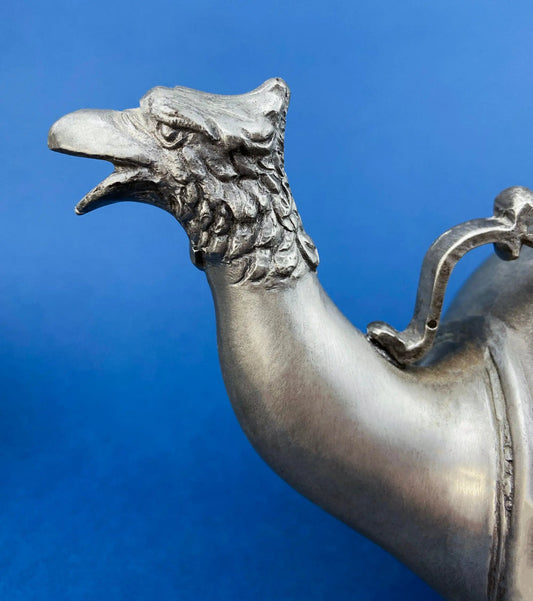 Pewter teapot spout shaped like an eagle head with textured neck and curved back handle on Tampa Home & Garden Store