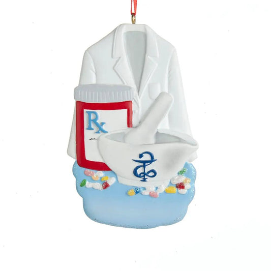 Pharmacist ornament in white coat with Rx bottle, mortar, pills on a light blue base on Tampa Home & Garden Store