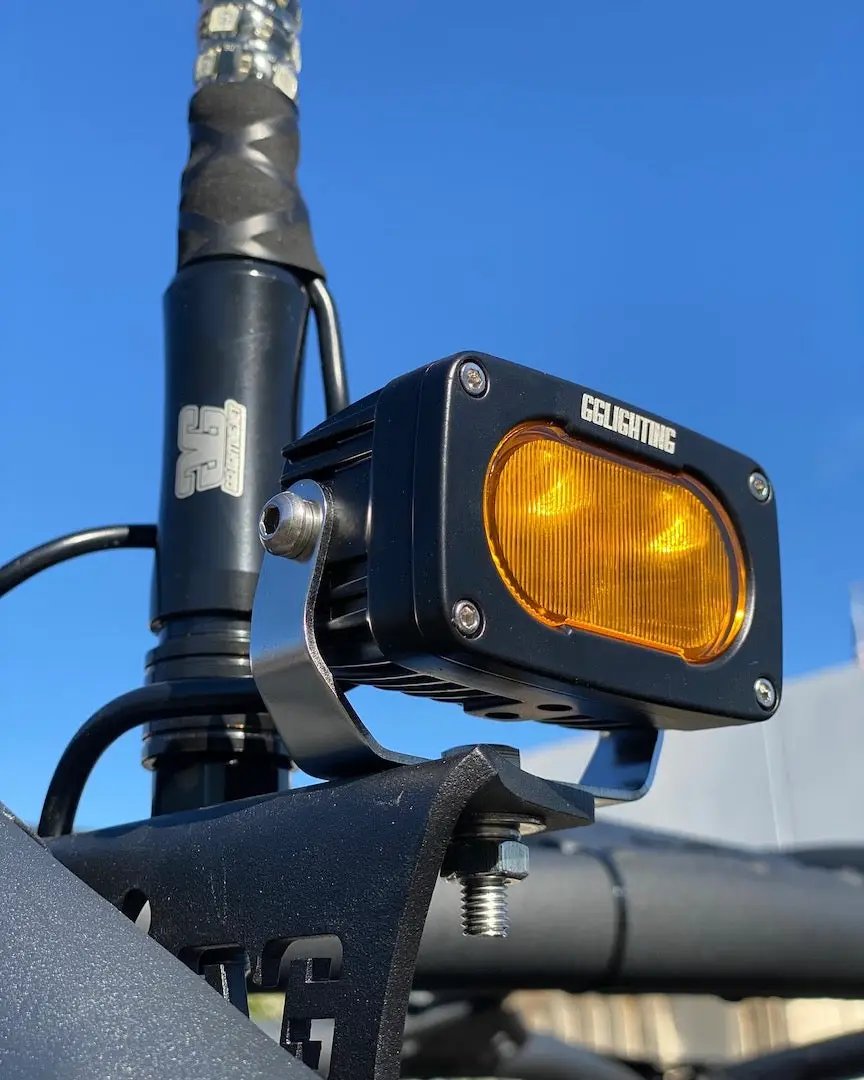 GP10 Flood Offroad LED Pod Amber Light by GGLighting mounted on a bracket on Tampa Home & Garden Store